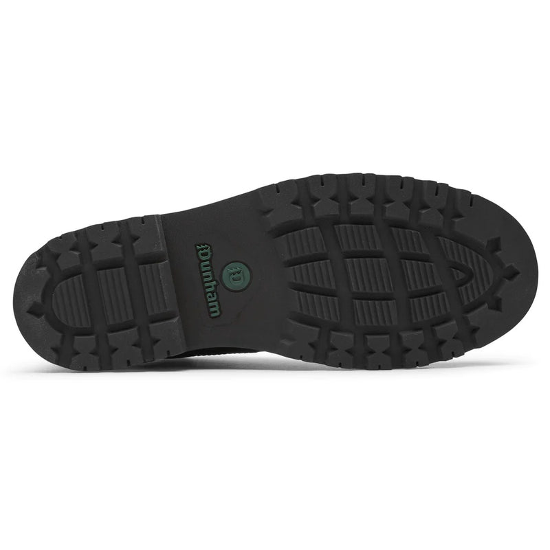 Dunham Byrne Waterproof Chukka Boot sole view showing black rubber outsole with lug traction pattern and green logo.