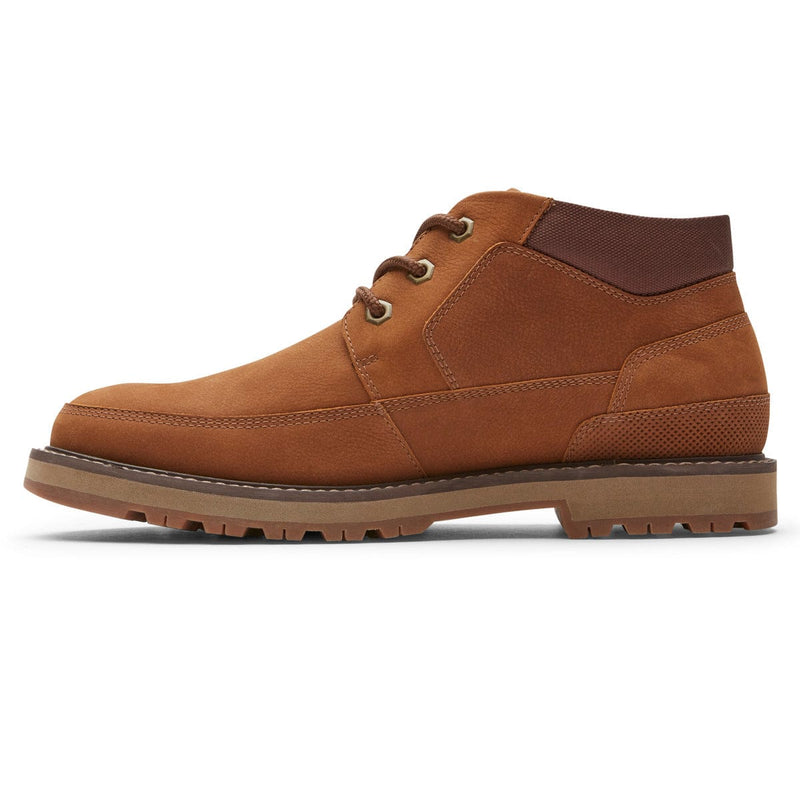 Dunham Byrne Waterproof Chukka Boot in tan leather with padded collar and rugged rubber outsole, side view.