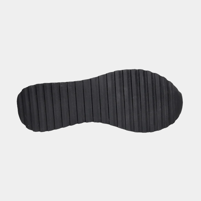 Propét Carmine Step In Sneakers outsole showing black rubber sole with textured traction pattern, bottom view.