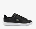 Lacoste Carnaby Set Leather Sneakers in black with white sole, embroidered crocodile logo, and lace-up closure, side view.