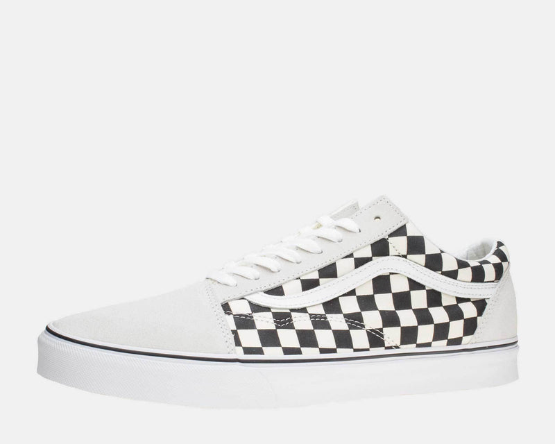 Vans Checkerboard Old Skool sneakers with black and white checkerboard canvas and white suede overlays, side view.