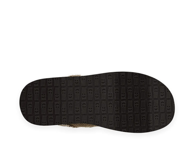 Sanuk Chiba shoe outsole in black featuring textured pattern with smiley face and block designs, sole/bottom view.
