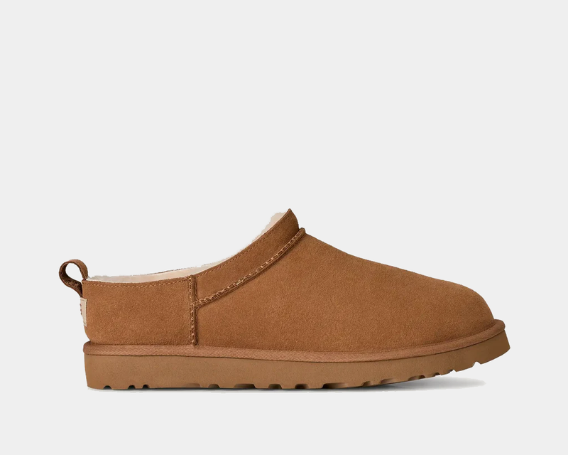UGG Classic Micro boots in chestnut brown suede with a pull tab and plush lining, side view.