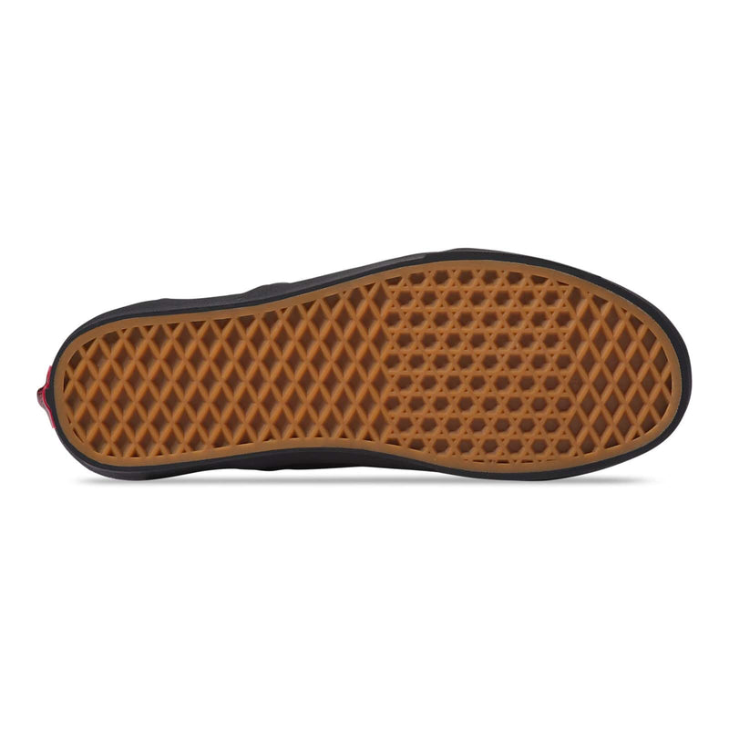 Vans Classic Slip On shoes outsole featuring signature waffle pattern in gum rubber, sole/bottom view.