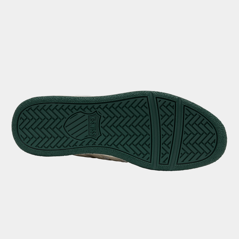 K-Swiss Classic VN sneaker outsole in dark green rubber with herringbone traction pattern, bottom view.