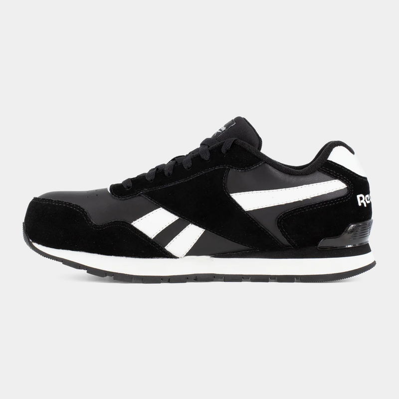 Reebok Work Classic Work Sneaker in black and white with suede and leather upper, side view.