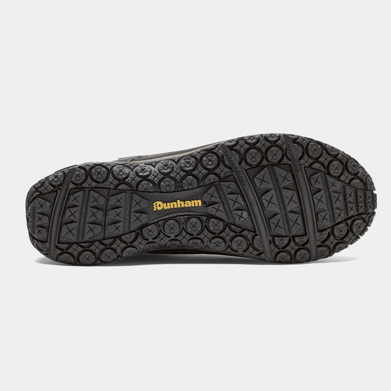 Dunham Cloud Plus Lace Up Waterproof Trekker outsole in black showing rugged tread pattern and Dunham logo in yellow.
