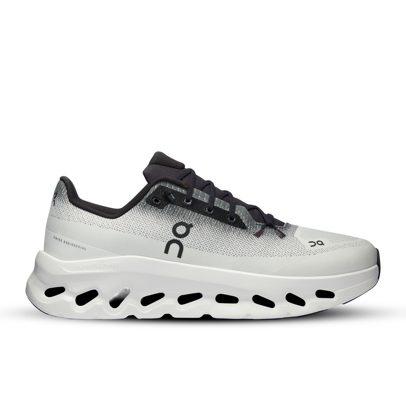 White and black running shoe on a white background