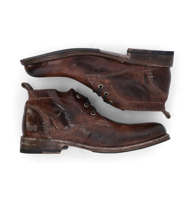 Bed Stu Clyde Chukka boots in distressed brown leather with lace-up closure and stacked heel, side view.