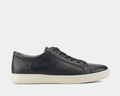 Rockport Colle Tie casual shoes in black leather with textured side panel and white rubber outsole, side view.