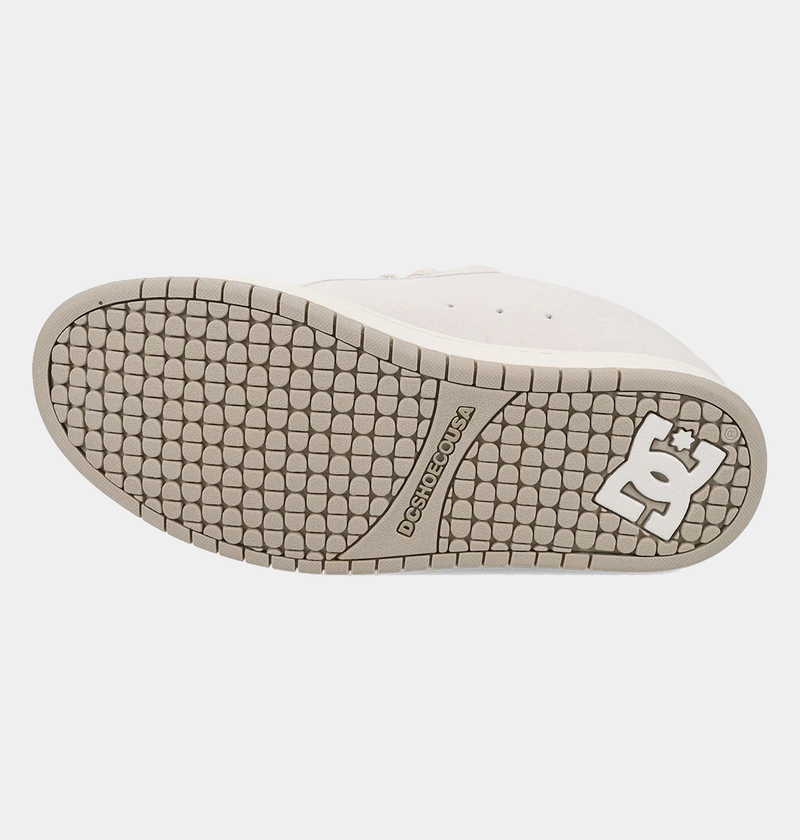 DC Footwear Court Graffik SE sneakers outsole in beige featuring textured grip pattern and logo detailing.
