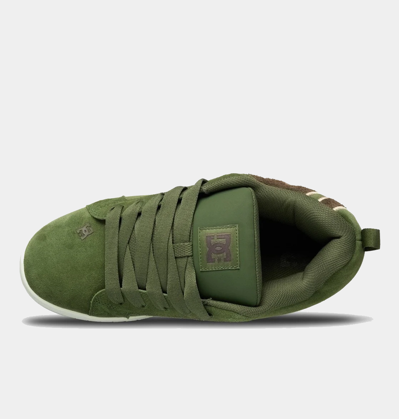 DC Footwear Court Graffik SE skate shoes in green suede with padded tongue and lace-up closure, top view