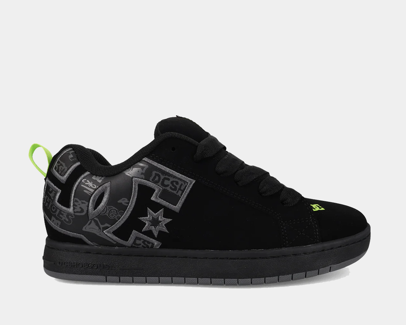 DC Footwear Court Graffik shoes in black with oversized gray logo detailing, neon green accents, and a low-top silhouette, side view.