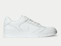 Polo Ralph Lauren Court Lux sneakers in white leather with embossed logo detail and perforated toe box, side view.