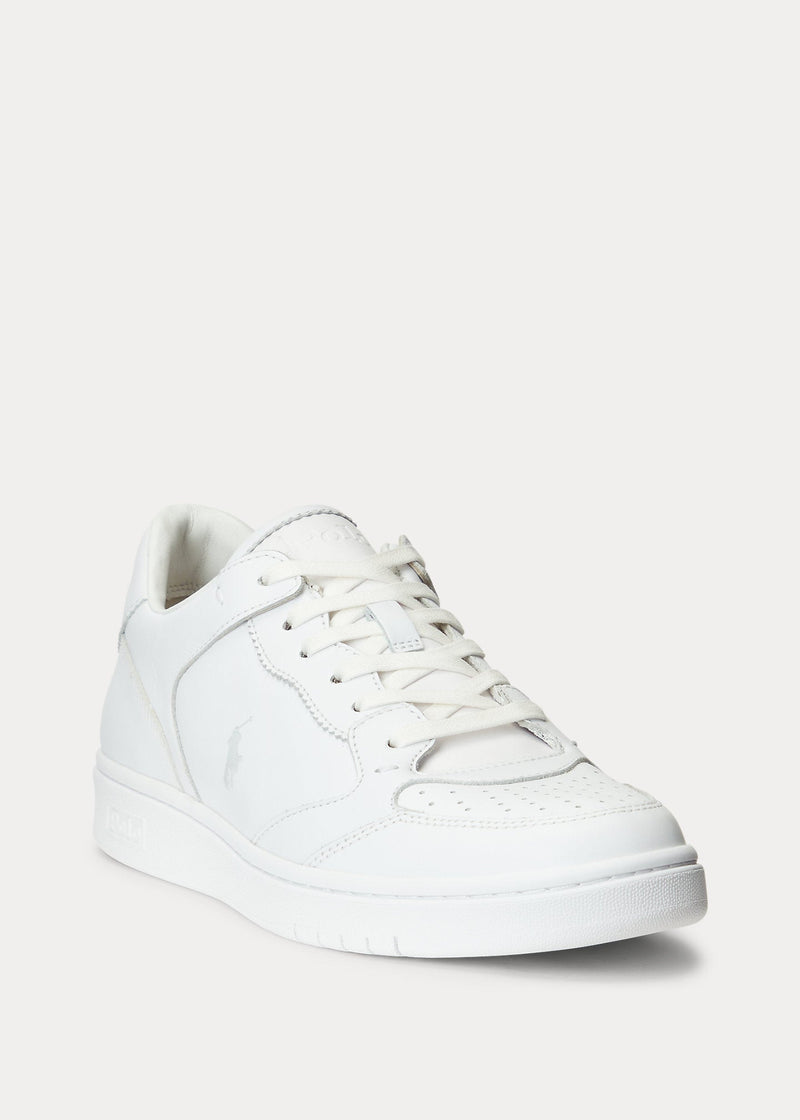 Polo Ralph Lauren Court Lux sneakers in white leather with perforated toe box and embossed logo details, front angled view.