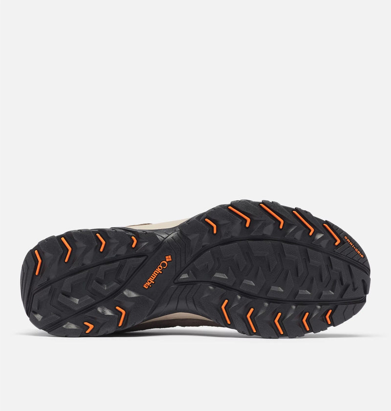 Columbia Crestwood Low hiking shoes outsole with Omni-Grip tread pattern in black rubber and orange accents, bottom view.
