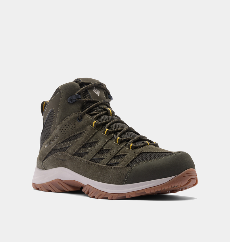 Columbia Crestwood Mid Waterproof hiking boots in olive green with suede and mesh upper, yellow accents, and rugged outsole, front-side view.