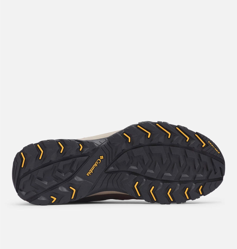 Columbia Crestwood Waterproof hiking shoes outsole with Omni-Grip rubber traction and yellow accents, sole/bottom view.