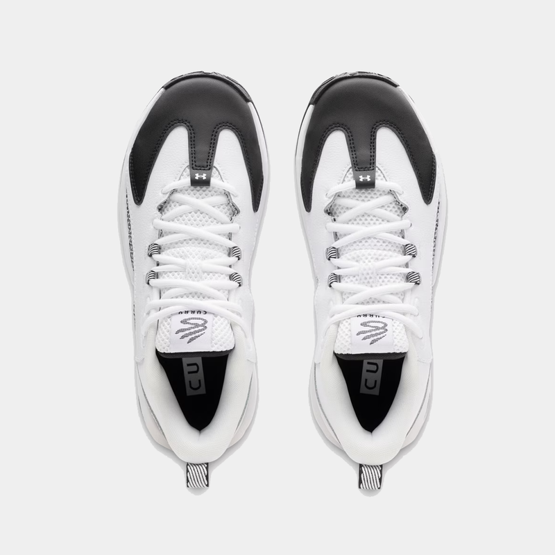Under Armour Curry 3Z 25 basketball shoes in white with black detailing, mesh upper, lace system, and branded tongue, top view.