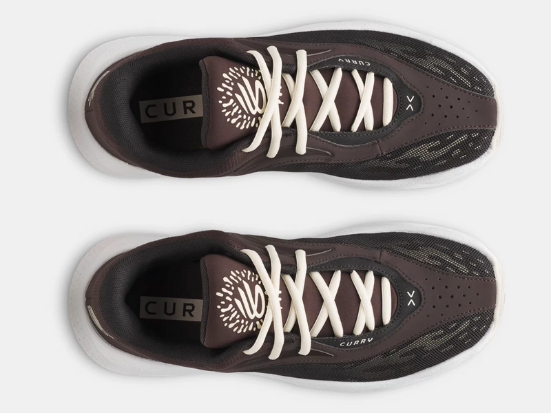 Under Armour Curry Splash 25 basketball shoes top view showing dark brown mesh upper, cream laces, and branded tongue detail.