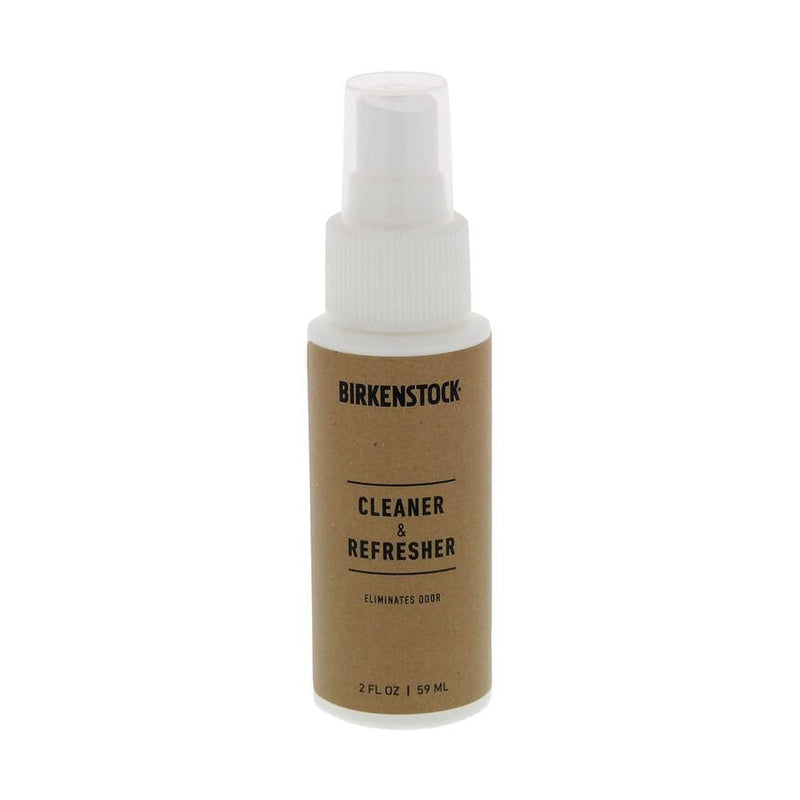 Birkenstock Deluxe Shoe Care Kit cleaner and refresher spray, 2 fl oz bottle with tan and white design, front view.