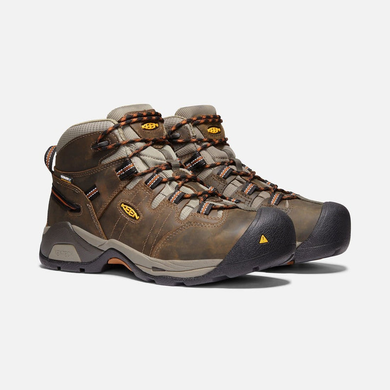 Keen Detroit XT Waterproof Boot in brown leather with protective toe cap, contrasting laces, and rugged outsole, angled front view.