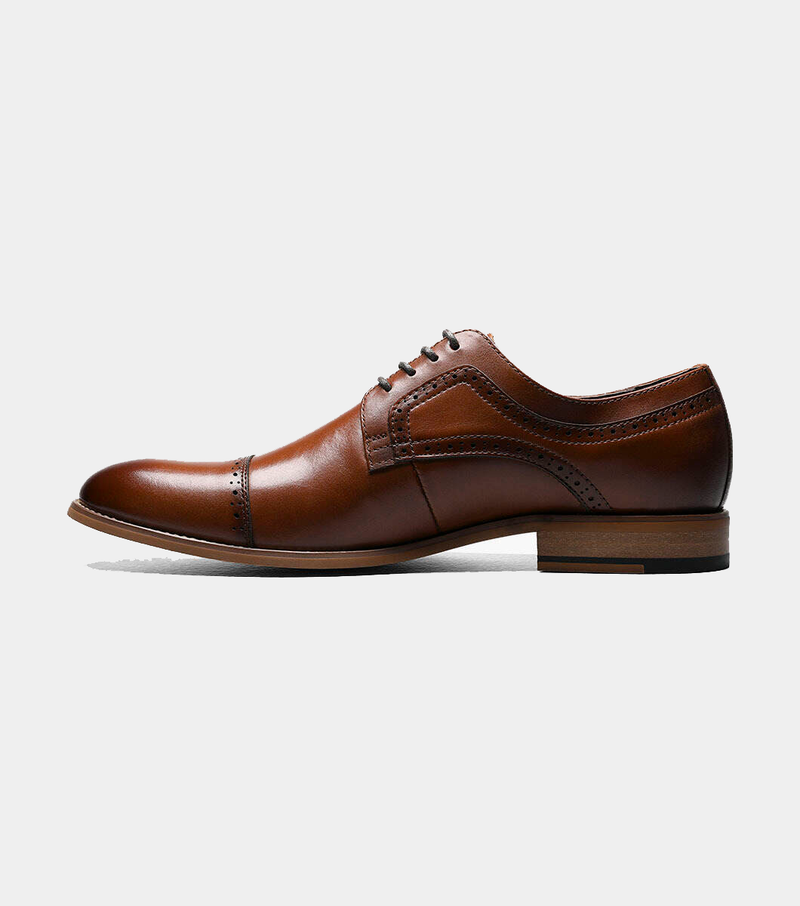 Stacy Adams Dickinson Cap Toe dress shoe in rich brown leather with brogue detailing and stacked wooden heel, side view.