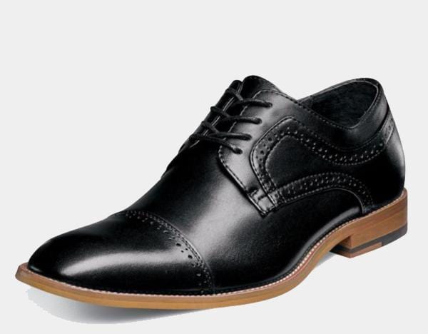 Stacy Adams Dickinson Cap Toe dress shoe in black leather with brogue accents and tan sole, side perspective.