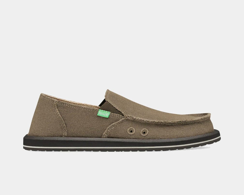 Sanuk Vagabond slip-on shoes in brown canvas with frayed edges, dual grommet details, and black sole, side view.