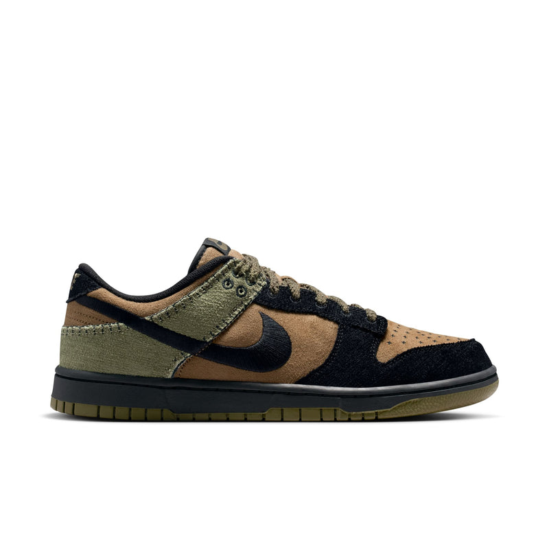 Nike Dunk Low Retro sneakers in brown, olive green, and black suede with perforated toe box and black rubber outsole, side view.