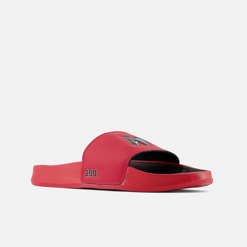 New Balance DynaSoft 200v2 VRSTY slides in red with black footbed, bold "N" logo on strap and cushioned sole, side angle.