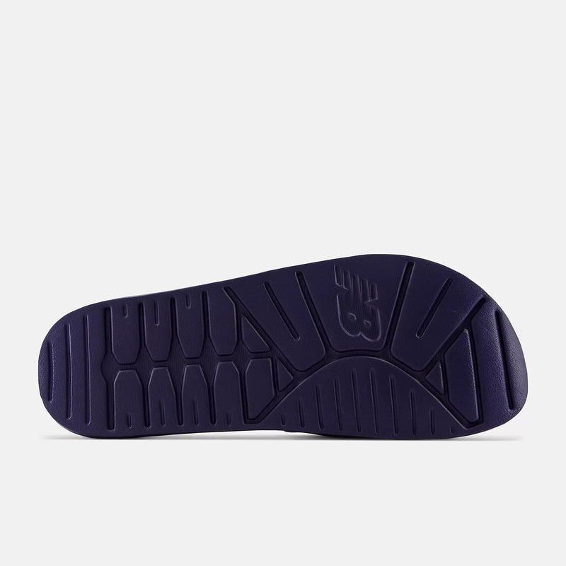 New Balance DynaSoft 200v2 sole featuring purple rubber outsole with textured tread pattern, bottom view.