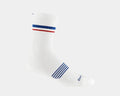 Darn Tough Element Micro Crew Lightweight Running Sock in white with red and blue stripes and ribbed cuff, side view.