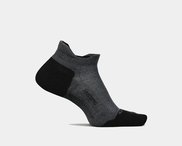 Feetures Elite Max Cushion No Show Tab socks in gray and black with anatomical design and cushioned heel, side view.