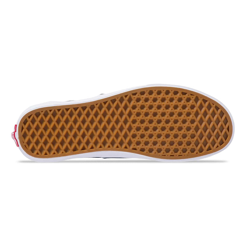 Vans Era Core sneakers outsole with gum rubber waffle tread and white sidewalls, bottom view.