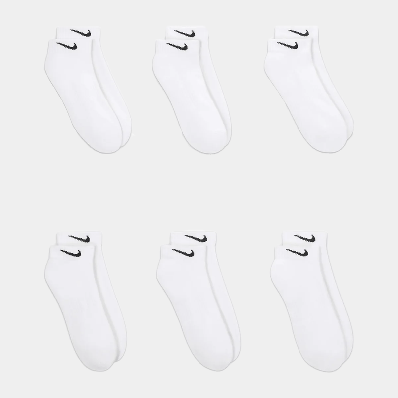 Nike Everyday Cushion Low Socks in white with black Nike logo, featuring soft fabric and cushioned soles, front view.