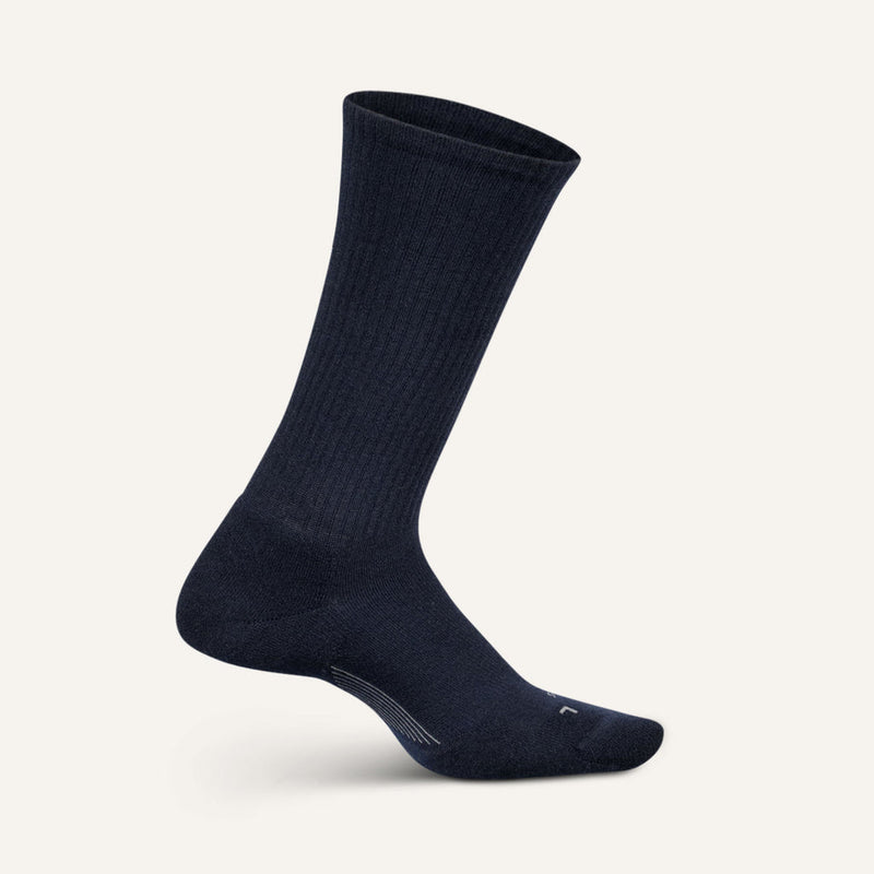 Feetures Everyday Max Cushion Crew socks in navy blue with ribbed design and padded sole, side view.