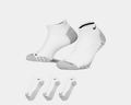 Nike Everyday Max Cushioned No Show Socks in white with gray reinforced heel and toe, ribbed arch support, and black Nike logo.