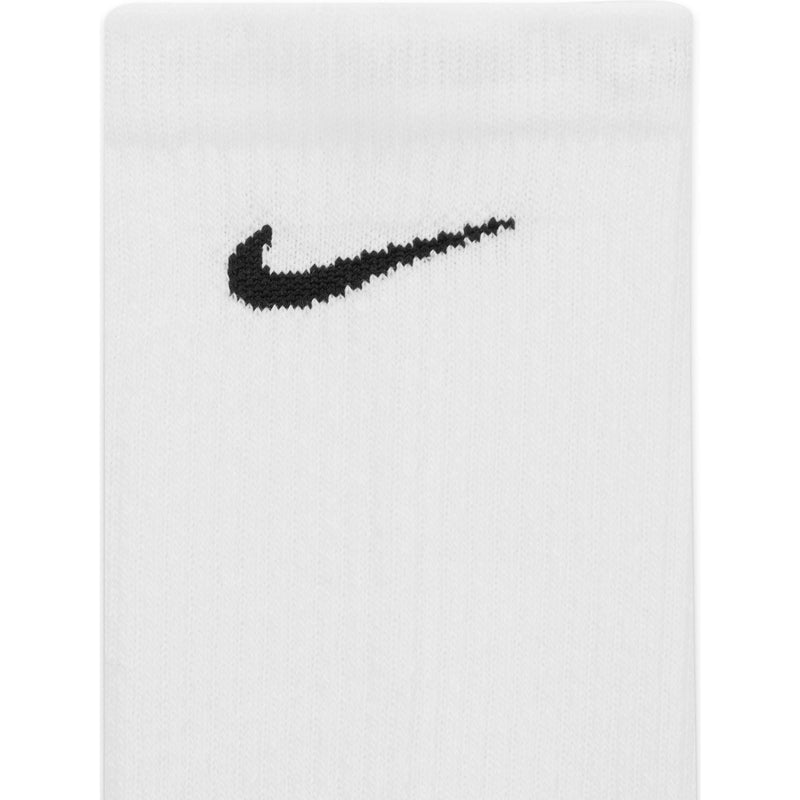 Nike Everyday Max Cushioned Training Crew Socks in white with black embroidered logo, ribbed texture, close-up view