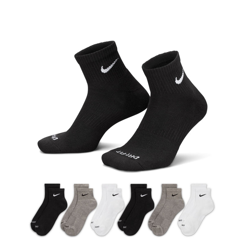 Nike Everyday Plus Cushioned Ankle Socks in black, gray, and white with ribbed cuffs and Dri-FIT technology, front view.