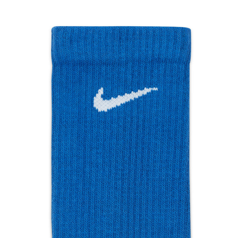 Nike Everyday Plus Cushioned Training Crew Socks in blue with white Nike swoosh logo, close-up of ribbed cuff.