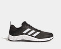 Adidas Everyset Trainer shoes in black with white accents, featuring mesh upper, cushioned midsole, and dual-density outsole, side view.