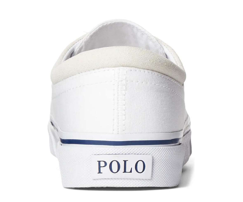 Polo Ralph Lauren Faxon X Canvas sneakers in white canvas with suede heel accent and embossed Polo branding on the heel tab, back view.
