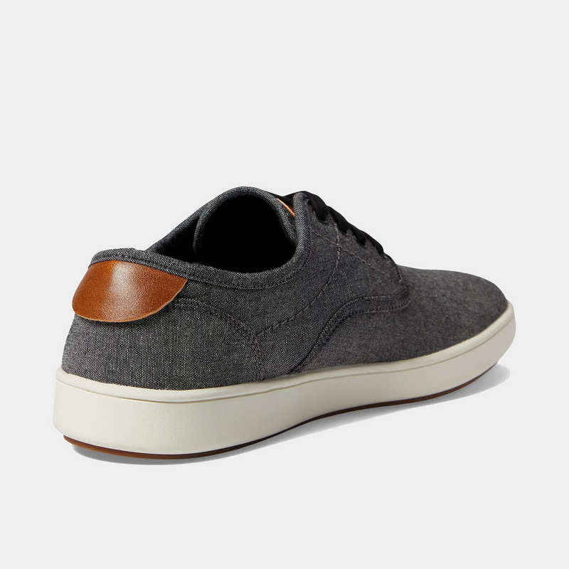 Steve Madden Fenta casual shoes in dark gray textile with brown leather heel detail and white midsole, back angle view