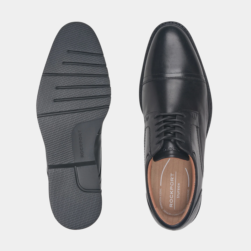 Rockport Findlay Lace-up Almond Toe Oxfords in black leather, top view showing lace-up design and cushioned insole alongside outsole with traction grooves.