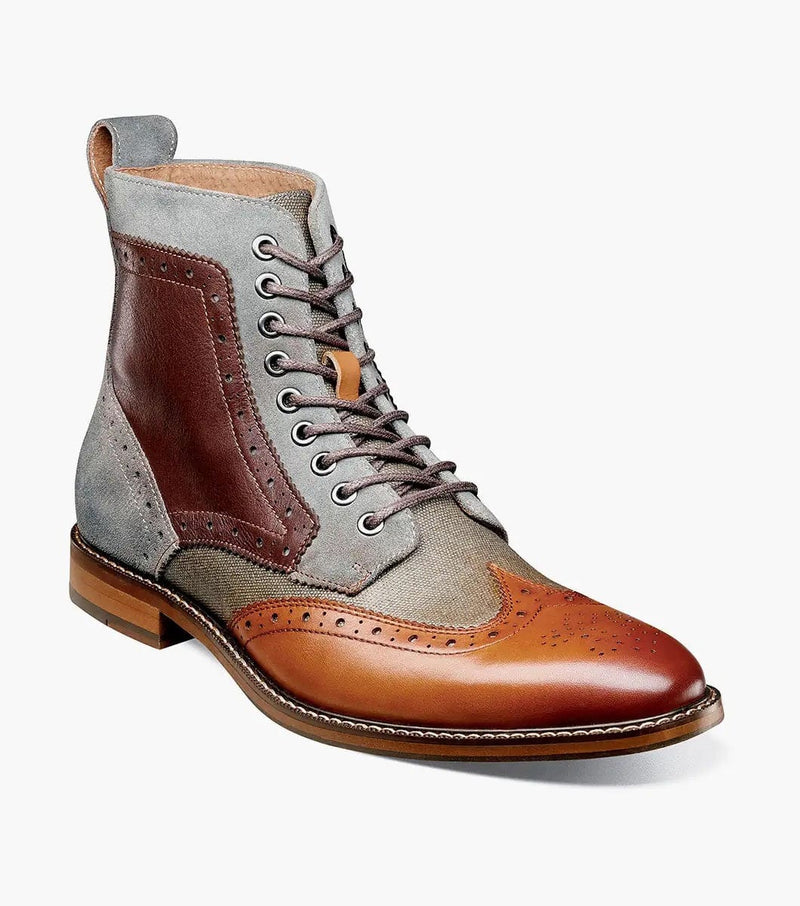 Stacy Adams Finnegan boots in brown leather and gray textile with brogue detailing and lace-up closure, front-side view.