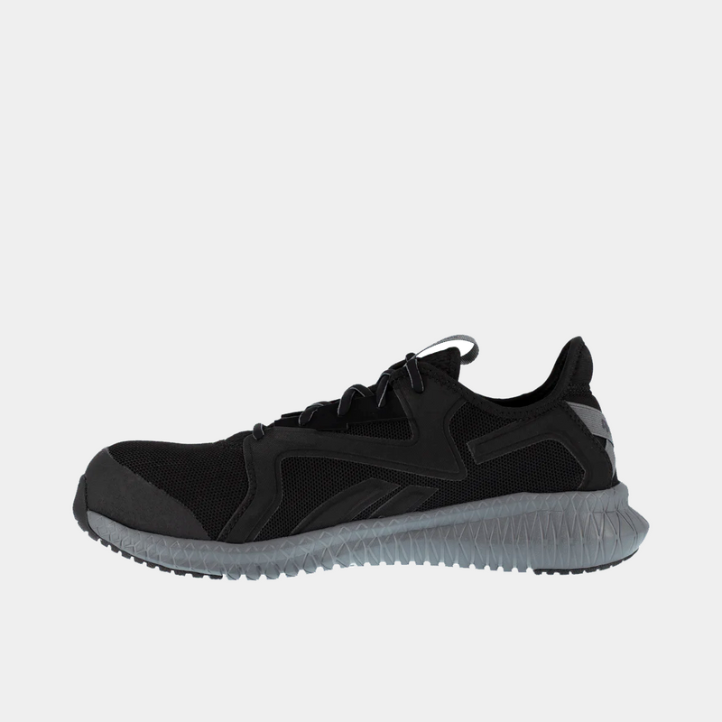 Reebok Work Flexagon 3.0 shoes in black with mesh upper and textured gray sole, side view showing sleek design.