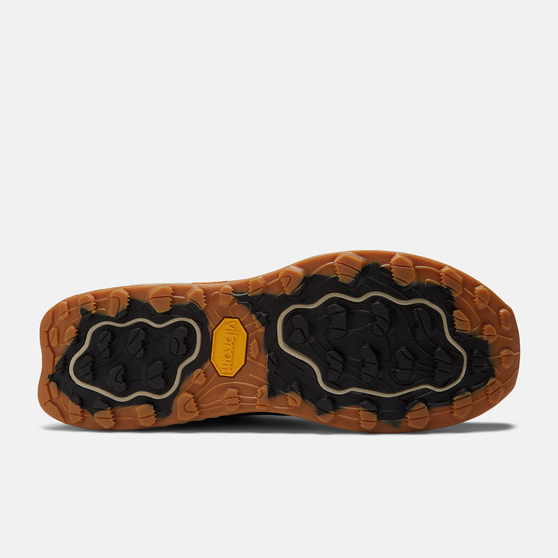 New Balance Foam X Hierro Mid GTX hiking boots outsole with Vibram tread design in black and brown rubber, bottom view.