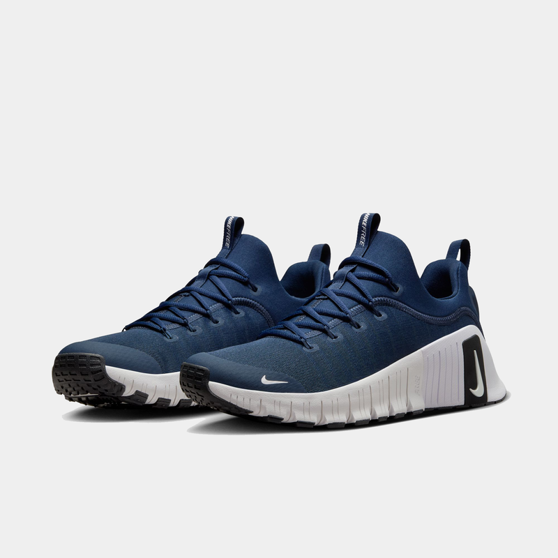 "Nike Free Metcon 6 TB training shoes in navy blue with mesh upper, white midsole, and black outsole, angled front view"
