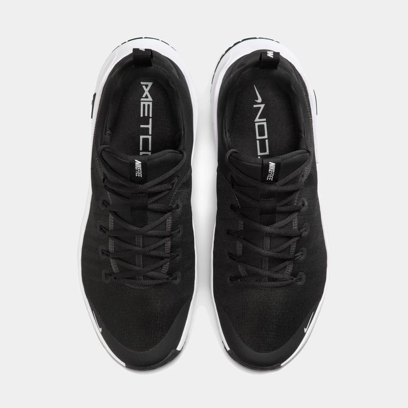 Nike Free Metcon 6 TB training shoes, top view showing black mesh upper, durable lace system, and white midsole.